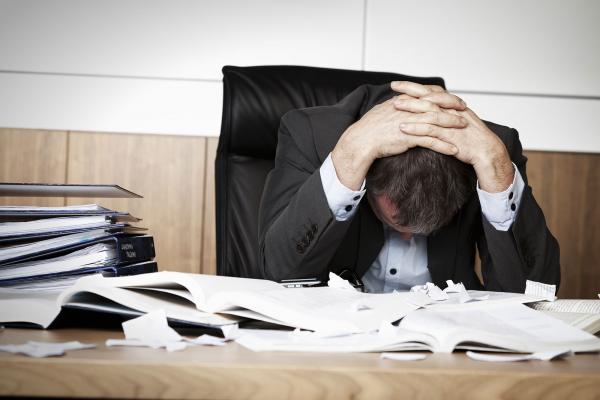 businessman_headache.jpg businessman_headache.jpg